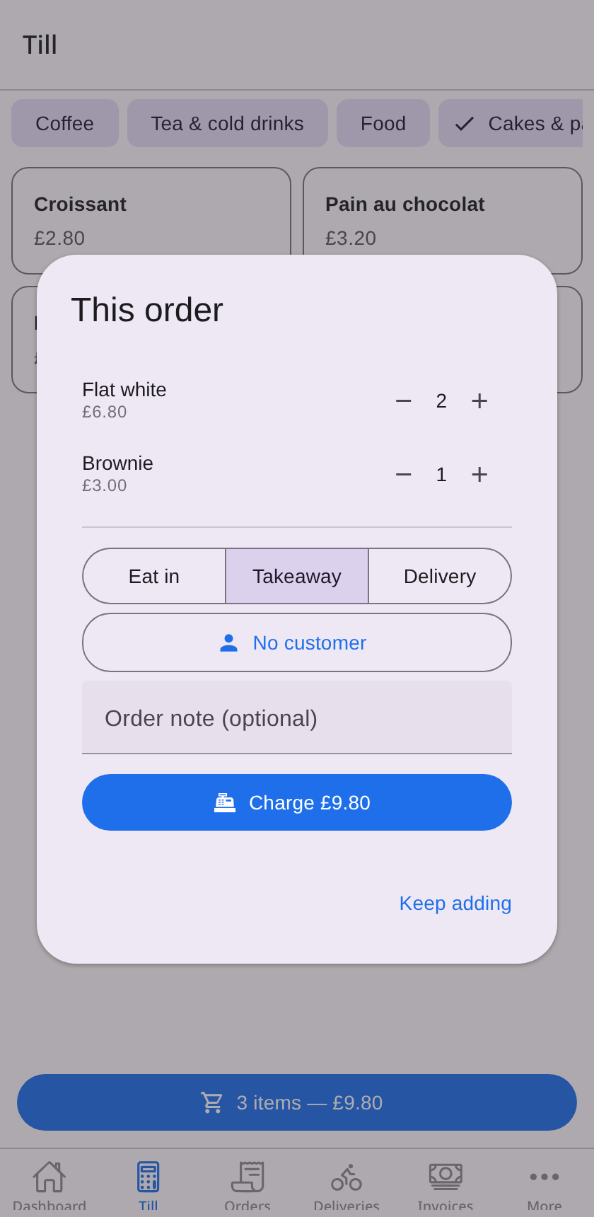 The MechanoMan till on a phone: the menu grid behind an open order of two flat whites and a brownie, eat-in / takeaway / delivery toggle, and a Charge £9.80 button